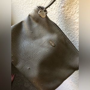 Wear and tear but cute little purse still in great condition otherwise&on inside